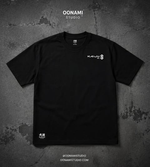 Black crewneck t-shirt with white graphic designs displayed against textured gray background, branded as Oonami Studio