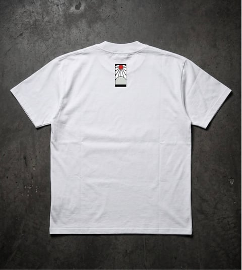 White t-shirt with small red and black graphic logo on back neckline, displayed flat on concrete background