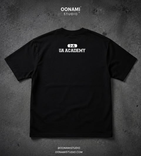 Black t-shirt with UA Academy text and logo printed on back, displayed flat against gray textured background