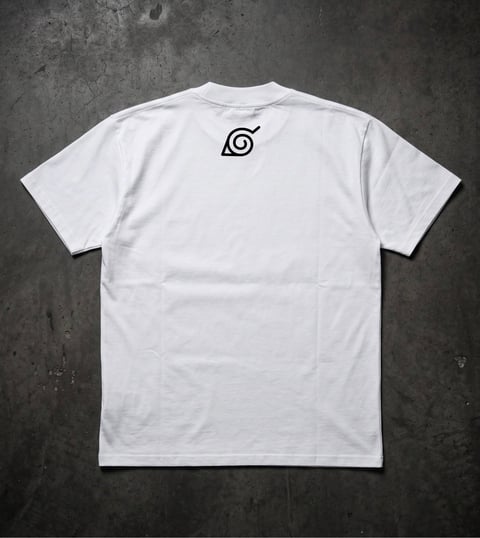 White t-shirt with black spiral symbol on back, displayed flat on gray concrete background